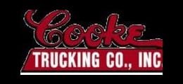 A red and white logo for cooke trucking company.